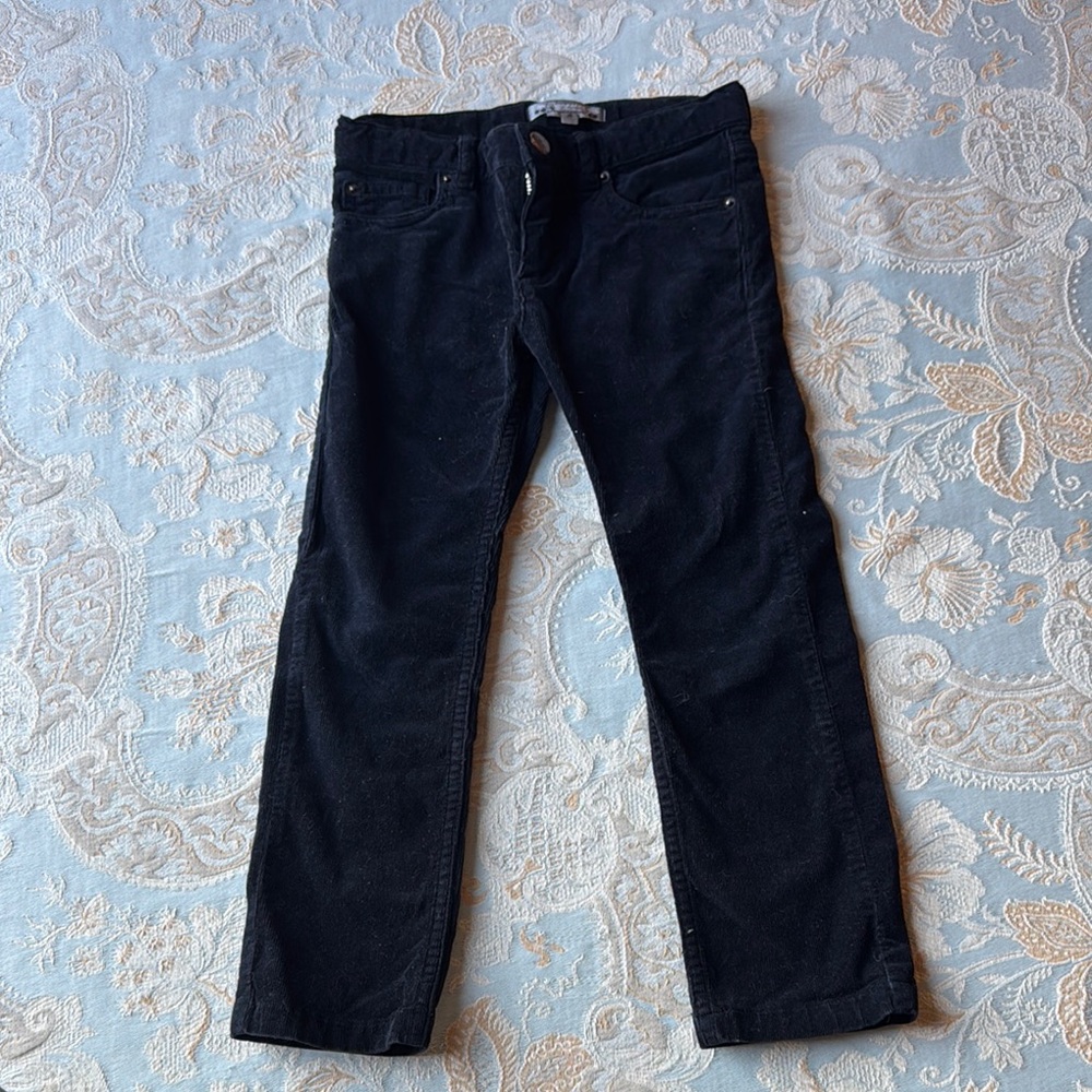 Boys Bonpoint black corduroy pants.
